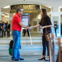 Attendees shaking hands